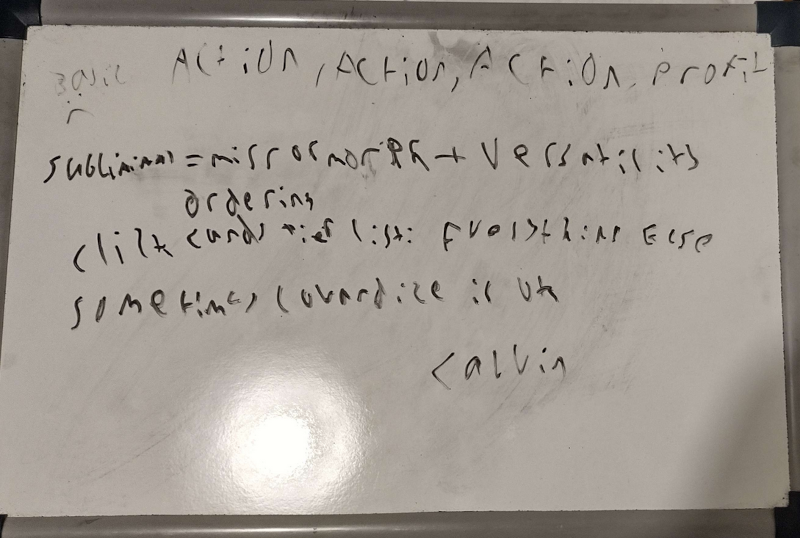 The esoteric scrawlings of someone on a whiteboard in bad handwriting.